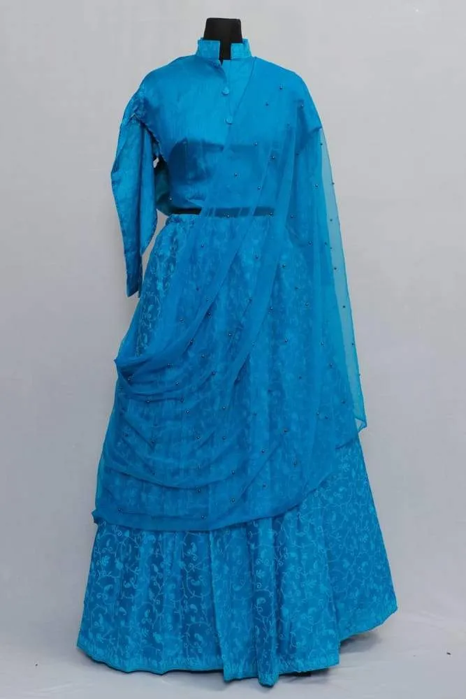 Blue Colour Kashmiri Embroidered Skirt With Crop Top And Matching Netted Dupatta.