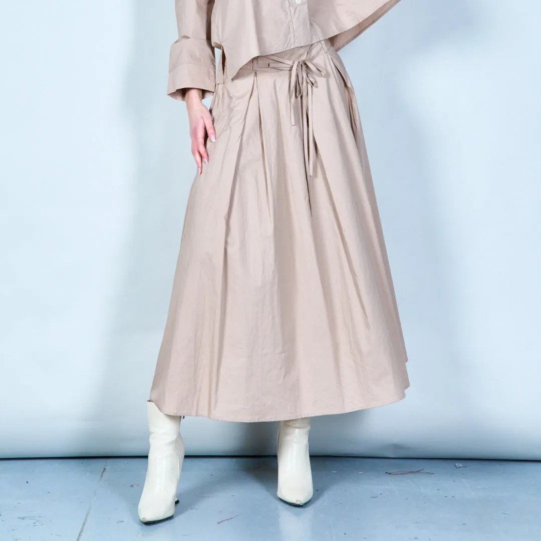 Pleated skirt with tie waist wholesale