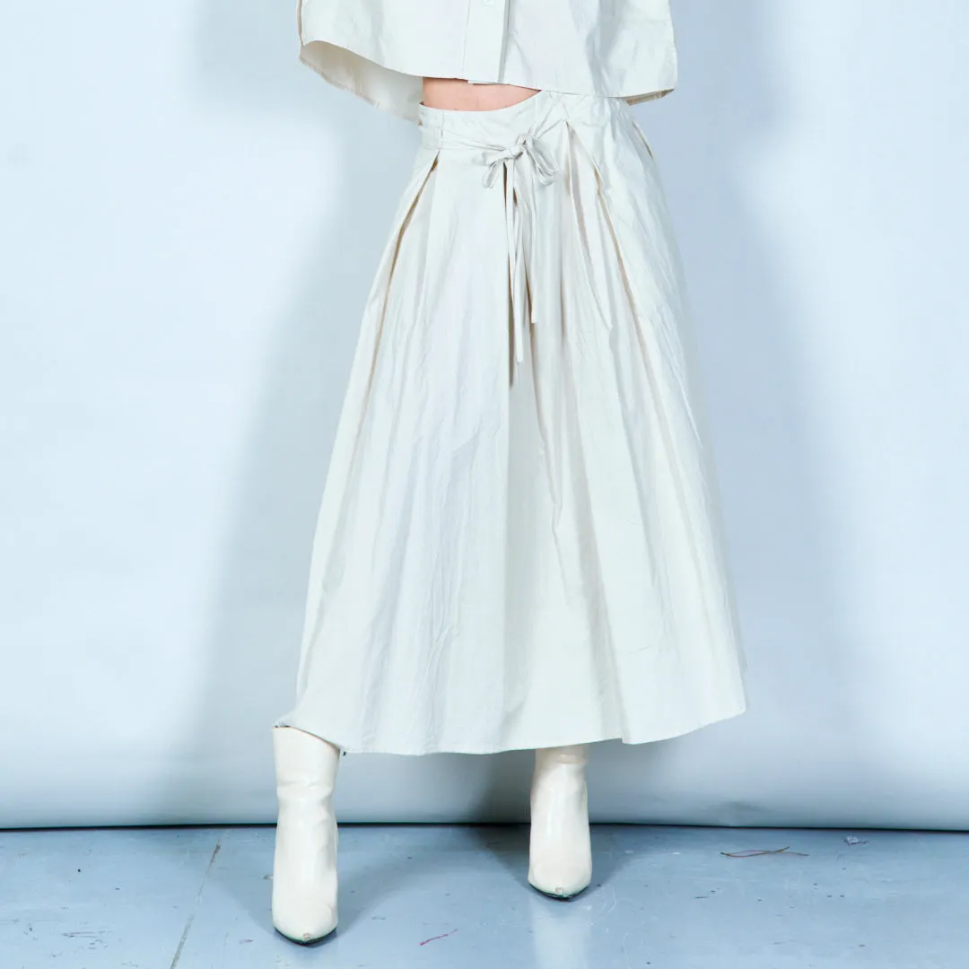 Pleated skirt with tie waist wholesale