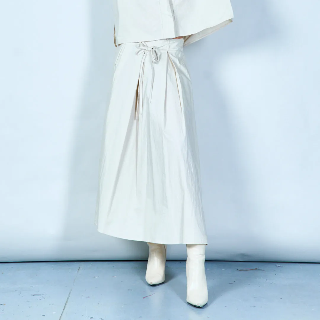 Pleated skirt with tie waist wholesale